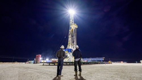 Drilling Supervisor Lloyd Shirley and Contractor Greg Rivera monitor the Roulette 3H well pad.