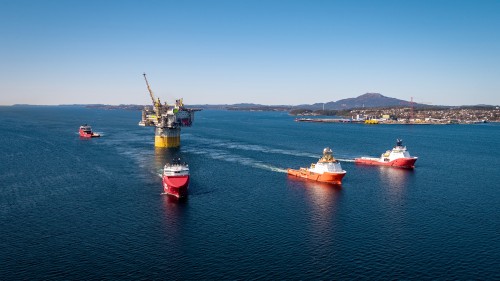 The Aasta Hansteen hull and topsides begin their journey from the Stord shipyard, where they were recently mated, to the development location in the Norwegian Sea, 186 miles offshore Norway.