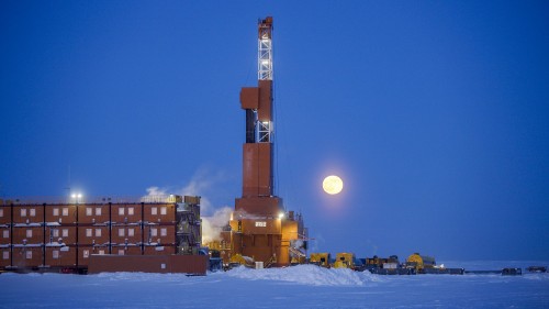 The moon rises behind Doyon Rig 141 at Tinmiaq 15, ConocoPhillips Alaska’s first appraisal well of the 2019 winter season.